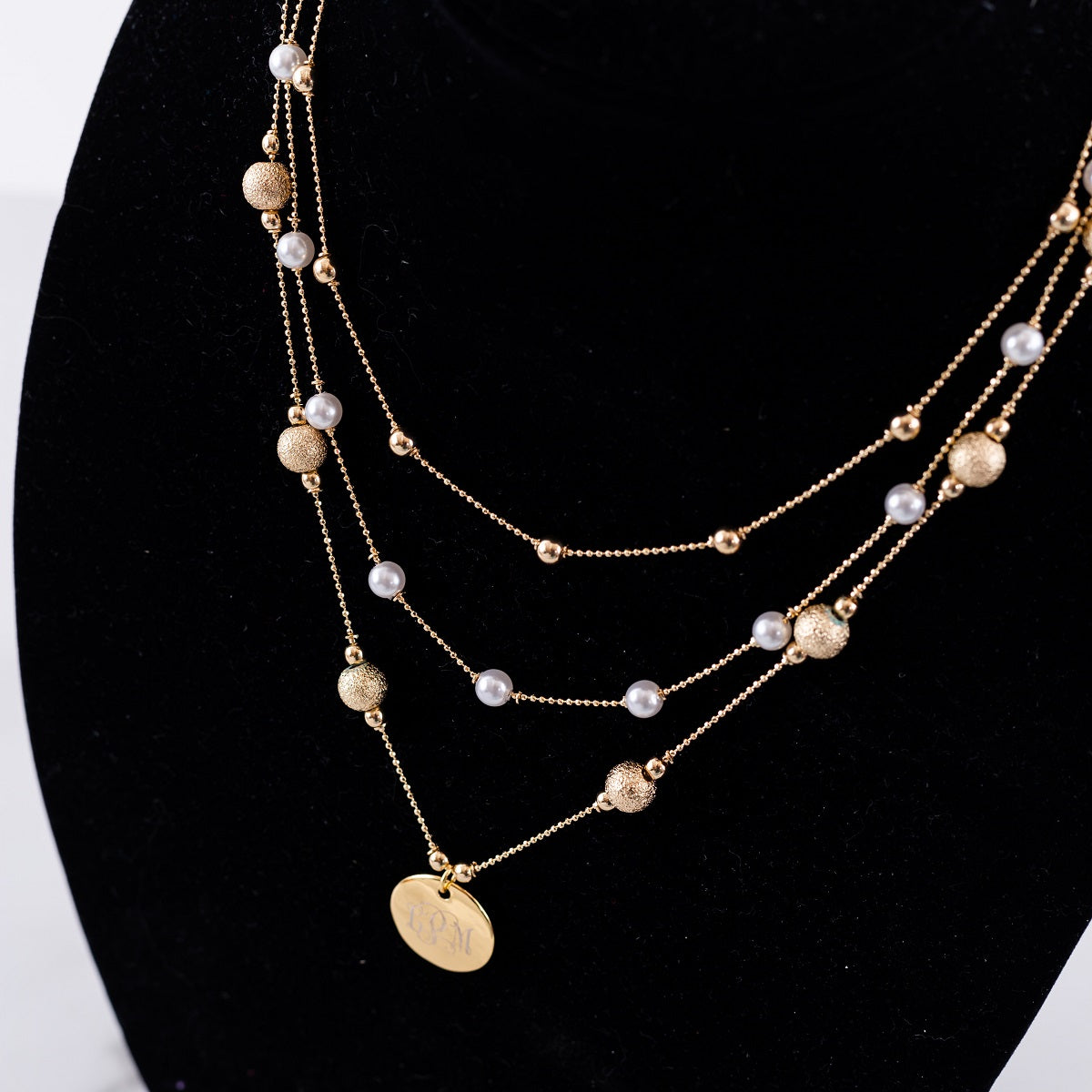 Gold Triple Strand Pearl Monogram Necklace
